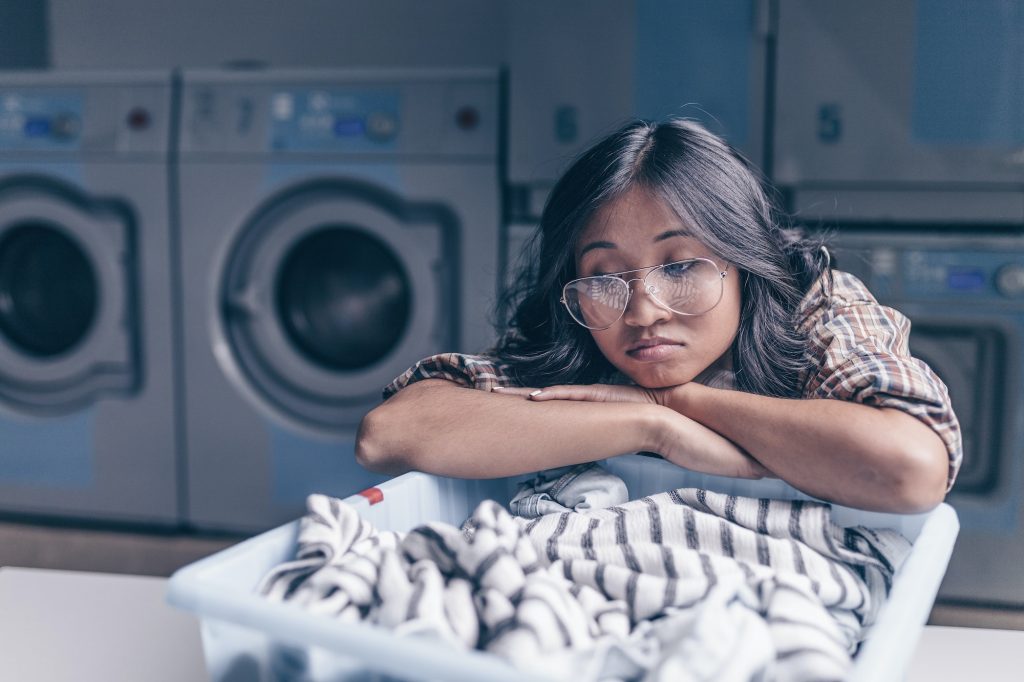 Young woman in laundry